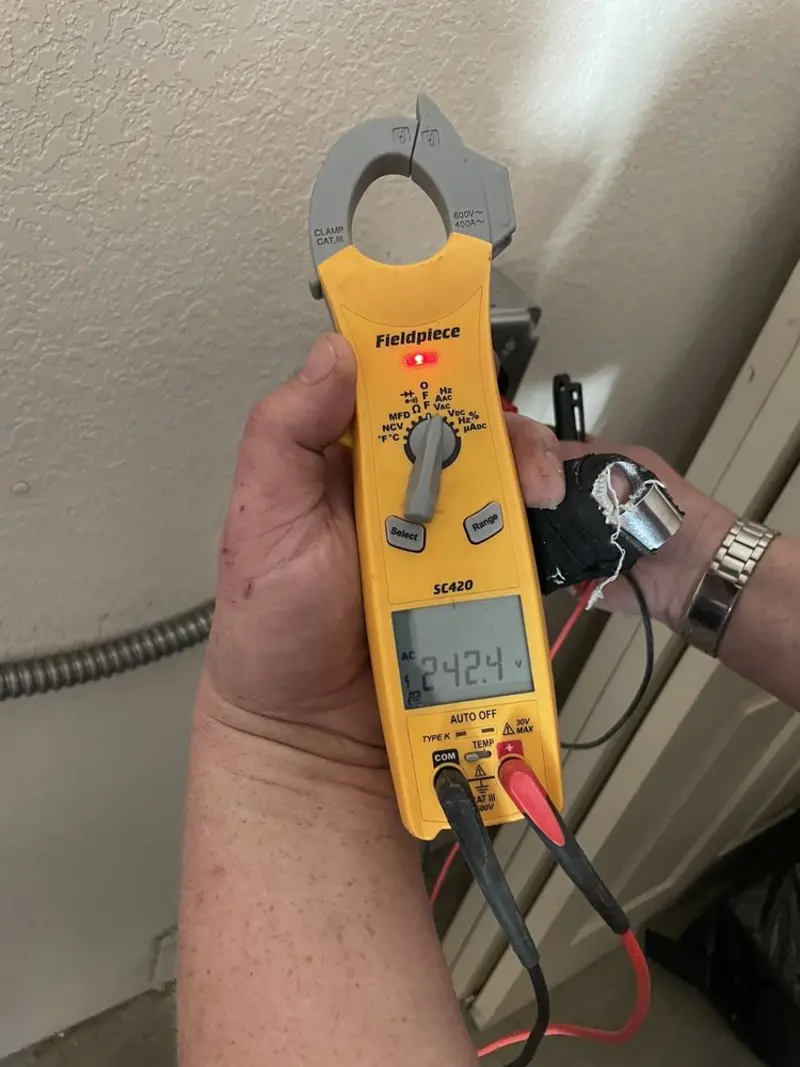 Voltage testing with clamp meter during Aluminum Wiring Replacement in East Rutherford